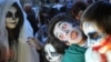 Kyrgyzstan -- Students dressed as zombies participate in an annual Halloween party in central Bishkek, October 31, 2013